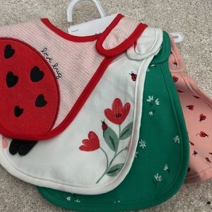 New with Tags - Water resistant bibs - 4 Pack